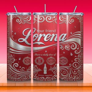 May include: A set of three red tumblers with silver accents and a straw. The tumblers feature the name "Lorena" in a stylized font, along with the text "Your friend" and "Share a daily dose of: Humor, Joy, Harmony, Happiness". The design includes decorative swirls and the Coca-Cola logo.