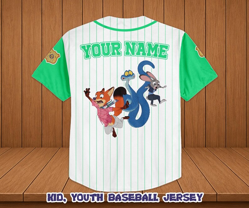 May include: White baseball jersey with green sleeves and collar. Features a cartoon graphic of a fox, rabbit, and snake. The text "YOUR NAME" is printed across the back in green. Vertical green stripes run down the front.