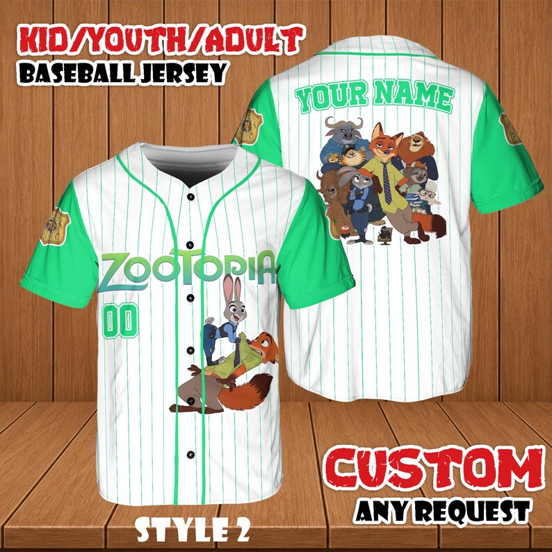 May include: White baseball jersey with green sleeves and accents, featuring the word "ZOOTOPIA" and the number "00". The jersey has a cartoon image of characters from the movie. The back of the jersey has the text "YOUR NAME" and a group of cartoon characters.