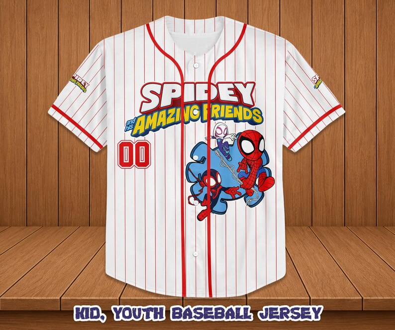 May include: White baseball jersey with red pinstripes and accents. Features the text "SPIDEY AND HIS AMAZING FRIENDS" and a graphic of the characters. Includes the number "00" in red. The sleeves have a small logo.