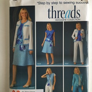 May include: Simplicity sewing pattern featuring a magazine collection. The pattern includes various women's outfits, such as a skirt suit, pantsuit, and separates. The outfits are in shades of blue and white. The pattern size is K5, sizes 8, 10, 12, 14, and 16.