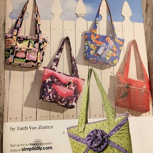 May include: Simplicity sewing pattern 3822 featuring tote bags in various designs. The bags include patterns with floral, butterfly, and polka dot prints. The pattern is by Faith Van Zanten and includes the text "ONE SIZE".