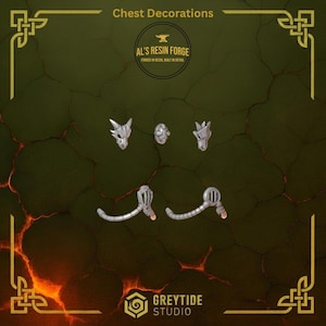 May include: A set of five grey resin miniature chest decorations featuring two horned skull-like pieces, one circular emblem, and two curved mechanical components with grilles. The text reads Chest Decorations, Al's Resin Forge, and Greytide Studio.