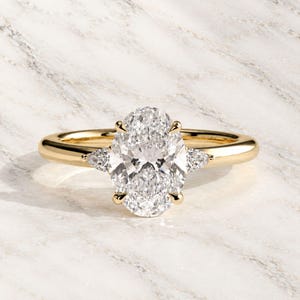 2ct Oval Moissanite Diamond  Claw Trilogy with Pear Side Diamond , Tulip Detail Engagement Ring , 14kt Gold Ring , Gift For Her ...