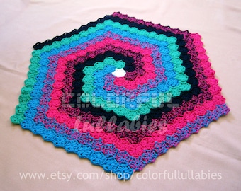 Crochet Hexagon Spiral Rug Pattern with continuous crochet technique. English and Spanish pattern. Motifs made without cutting the thread