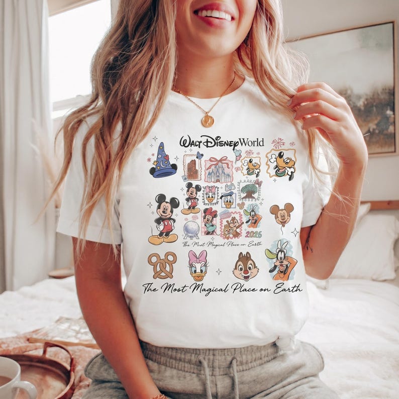 Retro 90s aesthetic white tee featuring Mickey Mouse and friends in a vintage character stamp layout.