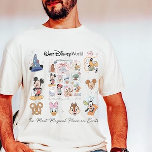 Men's cream t-shirt with colorful Disneyworld character mashup including Donald Duck and Chip and Dale.