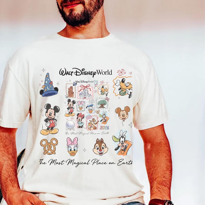 Men's cream t-shirt with colorful Disneyworld character mashup including Donald Duck and Chip and Dale.