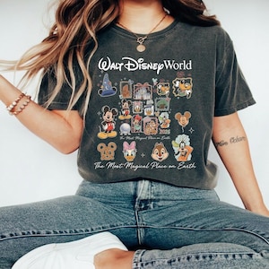 Lifestyle shot of a pepper grey graphic tee with Mickey and friends, styled for a nostalgic 90s streetwear look.