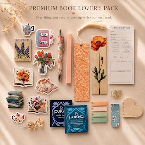 May include: A Premium Book Lover's Pack containing various stationery items: floral and book-themed stickers, a patterned pen, a highlighter, two bookmarks, a book review notepad, tea bags, sticky tabs, a metal book clip, and a heart-shaped felt piece.