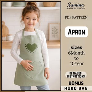 May include: A sage green apron featuring a dark green heart applique on the chest with a dotted border and a large heart-shaped pocket on the lower section with two buttons. The text reads Samina Pattern Studio, PDF Pattren, Apron, sizes 6Month to 10Year, Detialed Instructions, Bonus Hobo Bag.