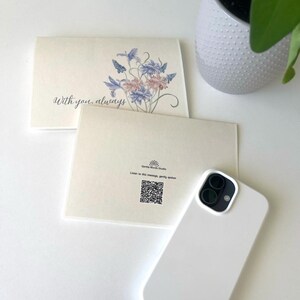 May include: Two cream-coloured greeting cards. One card features a watercolour floral illustration and the text "With you always." The other card displays the "Gentle Words Studio" logo, the text "Listen to this message, gently spoken," and a QR code.