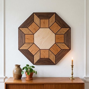 May include: An octagonal wooden wall art piece featuring a geometric star pattern composed of light, medium, and dark brown wood segments. The design includes a central light-colored octagon surrounded by alternating diamond and square wood panels.
