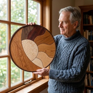 May include: A circular wooden wall art piece featuring a mosaic of various wood grains and tones, including light maple, medium cherry, and dark walnut, arranged in curved, interlocking segments within a dark circular frame.