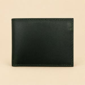 May include: A rectangular bi-fold wallet crafted from smooth, dark forest green leather. The wallet features clean, straight edges and is constructed with matching dark green stitching along the perimeter, creating a simple and uniform appearance.