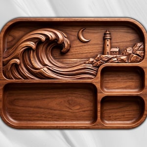 May include: A rectangular wooden serving tray with rounded corners, featuring a carved relief of a large ocean wave, a crescent moon, and a lighthouse on a rocky shore. The tray includes one large compartment and two smaller side compartments.