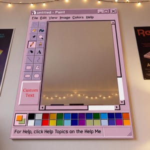 May include: A pink framed mirror designed to look like the Paint program interface. The mirror has a toolbar with icons, a colour palette, and the text "Custom Text". The top of the mirror reads "untitled - Paint".