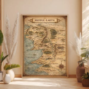 May include: A rectangular wall art print featuring a detailed, vintage-style map of Middle-earth. The map displays geographical regions, mountain ranges, and bodies of water in muted earth tones, with the text Middle-earth centred at the top.