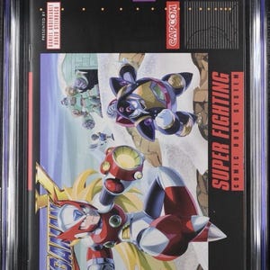 Könnte beinhalten: Ein CGC-bewerteter 9.8 Mega Man X #2 Comic von Udon Comics. Das Cover zeigt Zero in einer dynamischen Pose mit langem blondem Haar, rot-weißer Rüstung und einer großen Armkanone. Ein dunkelvioletter Roboter fliegt über einer Schneelandschaft.