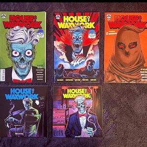 May include: Five House of Waxwork comic books and vinyl records featuring horror-themed cover art. The covers display illustrations of a blue-skinned figure in a tuxedo, a hooded character with red eyes, and a figure sitting in a theatre chair.