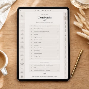 May include: A digital planner displayed on a tablet, featuring a contents page with sections like "Welcome," "Personal & Identity," and "Legal documents." The tablet is on a wooden surface, accompanied by a gold pen, a cup of coffee, and decorative dried flowers.