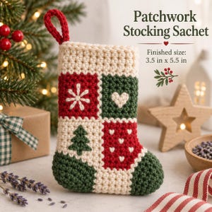 May include: A crochet patchwork stocking sachet with a red hanging loop, featuring cream, red, and dark green squares with embroidered snowflake, heart, and tree motifs. The text reads Patchwork Stocking Sachet and Finished size: 8.9 cm x 14 cm.