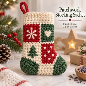 May include: A crochet patchwork stocking sachet featuring cream, red, and dark green yarn squares with embroidered snowflake, heart, and tree motifs. The text reads Patchwork Stocking Sachet and Finished size: 8.9 cm x 14 cm.