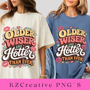 May include: Two t-shirts, one cream and one blue, each with the text "Older, Wiser, and Hotter Than Ever" in a retro font. The design includes hearts and lipstick kiss graphics. The bottom of the image has the text "KZCreative PNG'S".