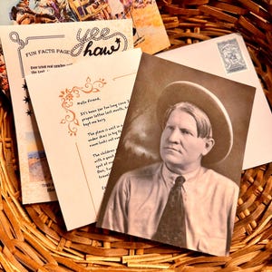 May include: A collection of vintage postcards and a sepia-toned photograph of a man in a cowboy hat, nestled in a woven basket. The postcards feature Western-themed illustrations and text, including "Yee Haw" and "Fun Facts Page."