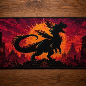 May include: A rectangular desk mat featuring a black silhouette of a feathered dragon standing on a stepped pyramid. The background displays a large orange sun set against a deep red sky with silhouettes of ancient stone structures and thorny vines.