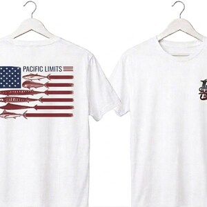 May include: White t-shirts with a nautical theme. One shirt features a design of an American flag with fish in place of stripes and the text "PACIFIC LIMITS". The other shirt has a small anchor and "PL" logo.