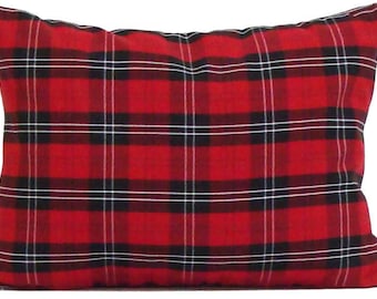 May include: Rectangular pillow with a red plaid pattern. The plaid design features black and white lines over a red background. The pillow is a decorative item, suitable for a bed or sofa.