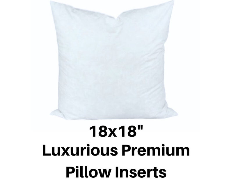 May include: A fluffy, white pillow insert, square-shaped, with dimensions of 18x18 inches. The text below the pillow reads "18x18" and "Luxurious Premium Pillow Inserts". The pillow is made of a soft, plush material.
