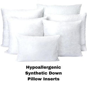 May include: A collection of white, fluffy pillow inserts. The image displays several rectangular and square pillows, arranged to showcase their shape and texture. Text at the bottom reads: Hypoallergenic Synthetic Down Pillow Inserts.