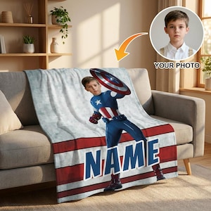 May include: A personalized Captain America blanket featuring a child in a superhero costume. The blanket has a red, white, and blue design with the word "NAME" in large blue letters. A photo of a child is in the upper right corner.