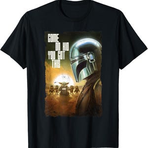 Op de afbeelding: Zwart T-shirt met een afbeelding uit de serie The Mandalorian. Het ontwerp toont de helm van de Mandalorian, Grogu en de tekst "COME ON KID YOU GOT THIS".