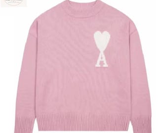 Jersey de punto Ami Paris Heart para mujer, jersey de punto extragrande, top de invierno suave y coqueto de estilo auténtico.