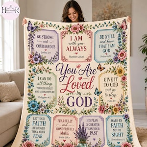 May include: A cream-colored throw blanket featuring floral borders, butterflies, and religious text including "You Are Loved by GOD" and various Bible verses. The design incorporates colorful flowers, vines, and framed sections with inspirational quotes.