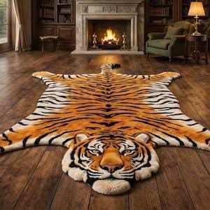 May include: A tiger-shaped area rug featuring a realistic orange, black, and white striped pattern. The rug is designed in the form of a full-body tiger, complete with a detailed head, four outstretched limbs, and a long tail extending outward.