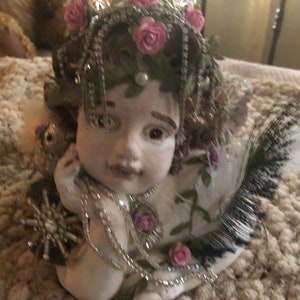 Large Winged crowned Cherub with Bird, Laying Cherub, Embellished Cherub