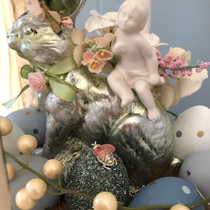 Easter centerpiece, Foiled wrapped rabbit, Cherub, Candelabra