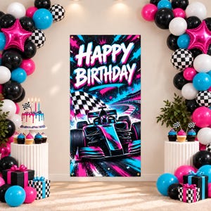 May include: A vertical rectangular banner featuring a racing car and a checkered flag with the text HAPPY BIRTHDAY in white, set against a vibrant neon blue and pink abstract background, surrounded by clusters of black, white, pink, and blue balloons.