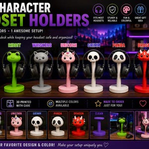 May include: Seven character-themed headset holders in green, grey, pink, white, black and white, red, and purple. Each stand features a unique top design including a frog, cat, unicorn, skull, panda, dragon, and a plain circular top for headphones.