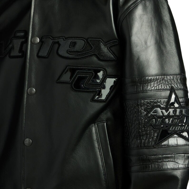 Handmade men’s aviator flight jacket featuring striped ribbed cuffs and welt pockets