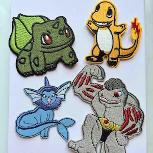 May include: Four embroidered patches featuring cartoon characters. Includes a green Bulbasaur, an orange Charmander, a blue Vaporeon, and a gray Machamp. Each patch has detailed stitching and vibrant colours, ideal for decorating clothing or accessories.