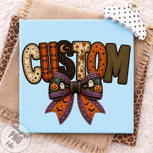 May include: A light blue square graphic featuring the word CUSTOM in large, stitched-style letters with various Halloween patterns including ghosts, pumpkins, and plaid. A large, decorative bow with a black, purple, and orange Halloween print sits below.