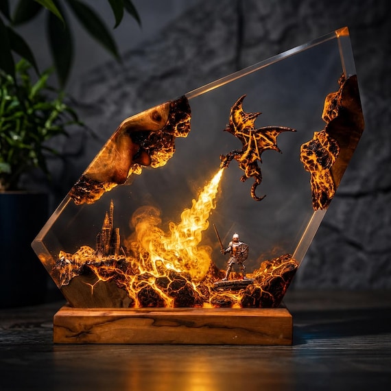 A hand-cast epoxy resin diorama of a knight battling a lava dragon that doubles as a glowing night light — genuinely one-of-a-kind tabletop art.
