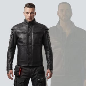 May include: Black leather jacket with a stand-up collar, button closure, and shoulder accents. The jacket is paired with black cargo pants. A small black pouch with a red light is attached to the pants. The text "NIGHT CITY" is visible on the pants.