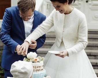 ivory jacket for wedding guest