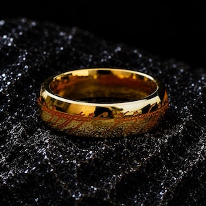 Ring med alvisk inskription, kupolring i guld, silver, rostfritt stål, en ring
